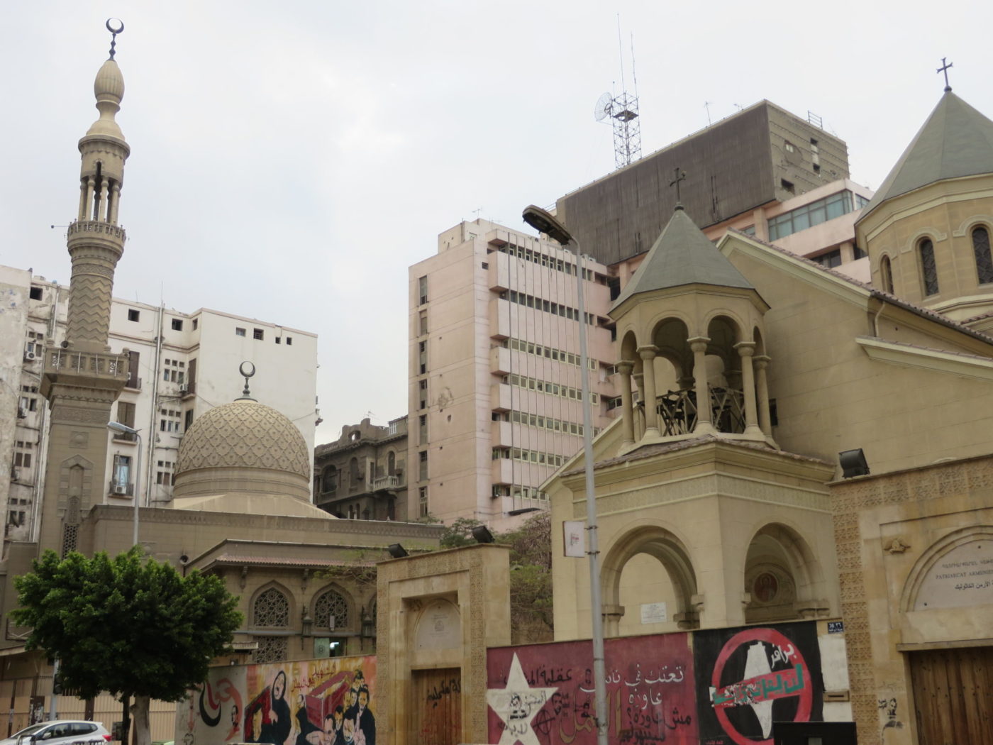 A Catholic church near an Muslim mosque