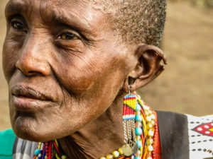 A Maasai woman looking somewhere in Kenya