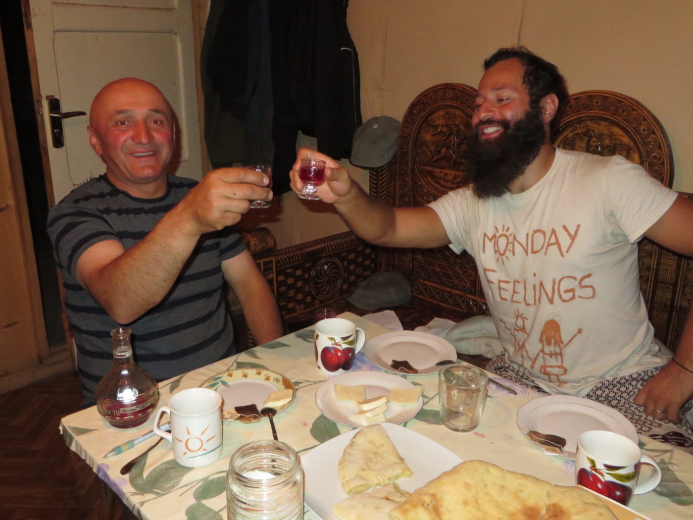 Tiago and his Georgian host toasts drinks