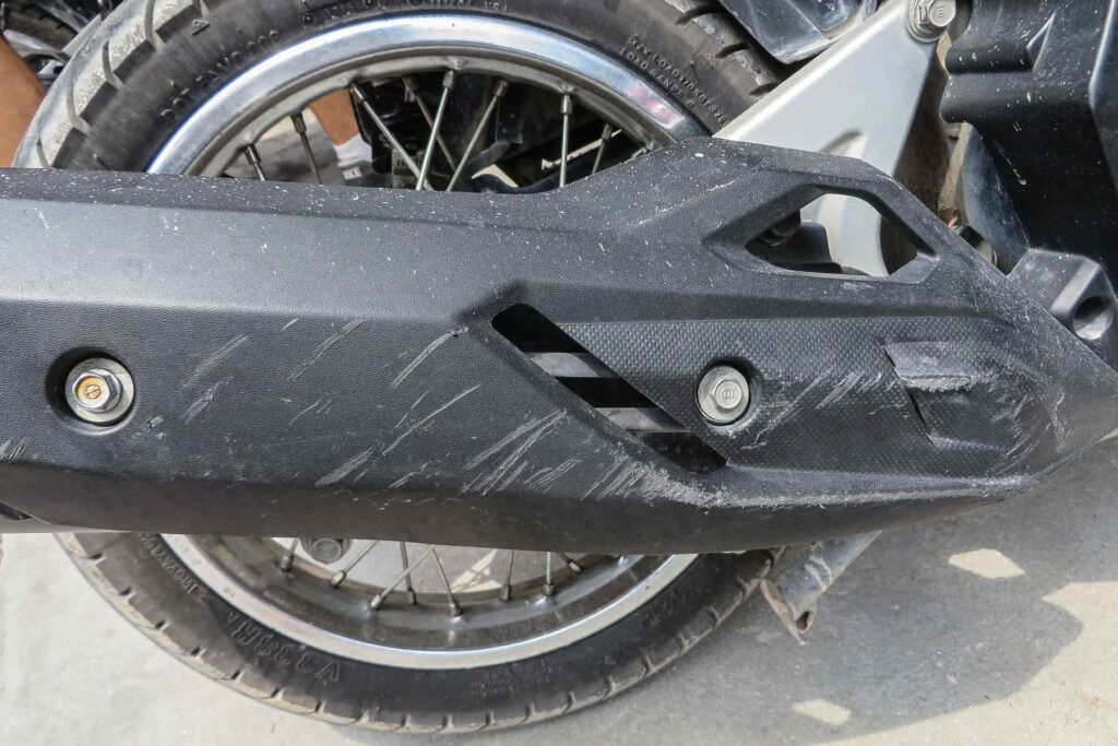 a scratch on the side of the motorbike