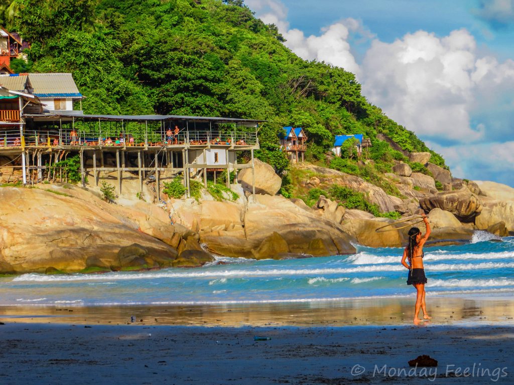 Full moon party 2019 Girl playing in the beach in Koh Phangan during the Full Moon Party 2019