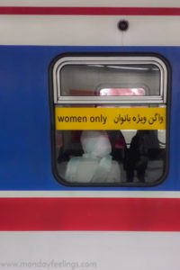 window of metro saying women only in persian