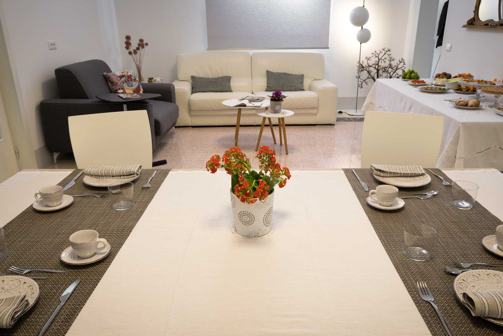 a set up table in the dining room of the hotel in Lecce