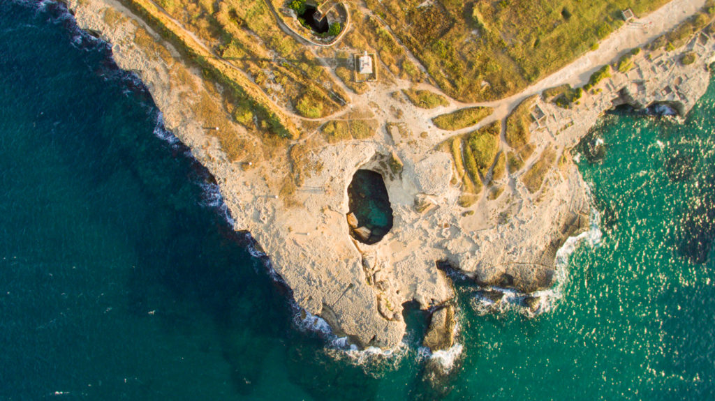 Puglia itinerary aerial shot of the Grotta della Poesia in Puglia