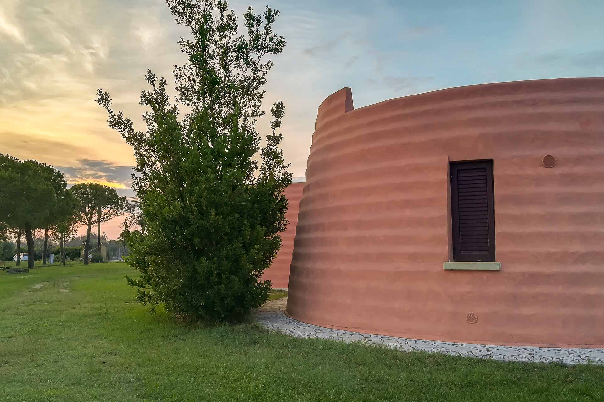 outside one of the bedrooms of La Baronessa Masseria in Puglia showing the innovative architecture of the rooms