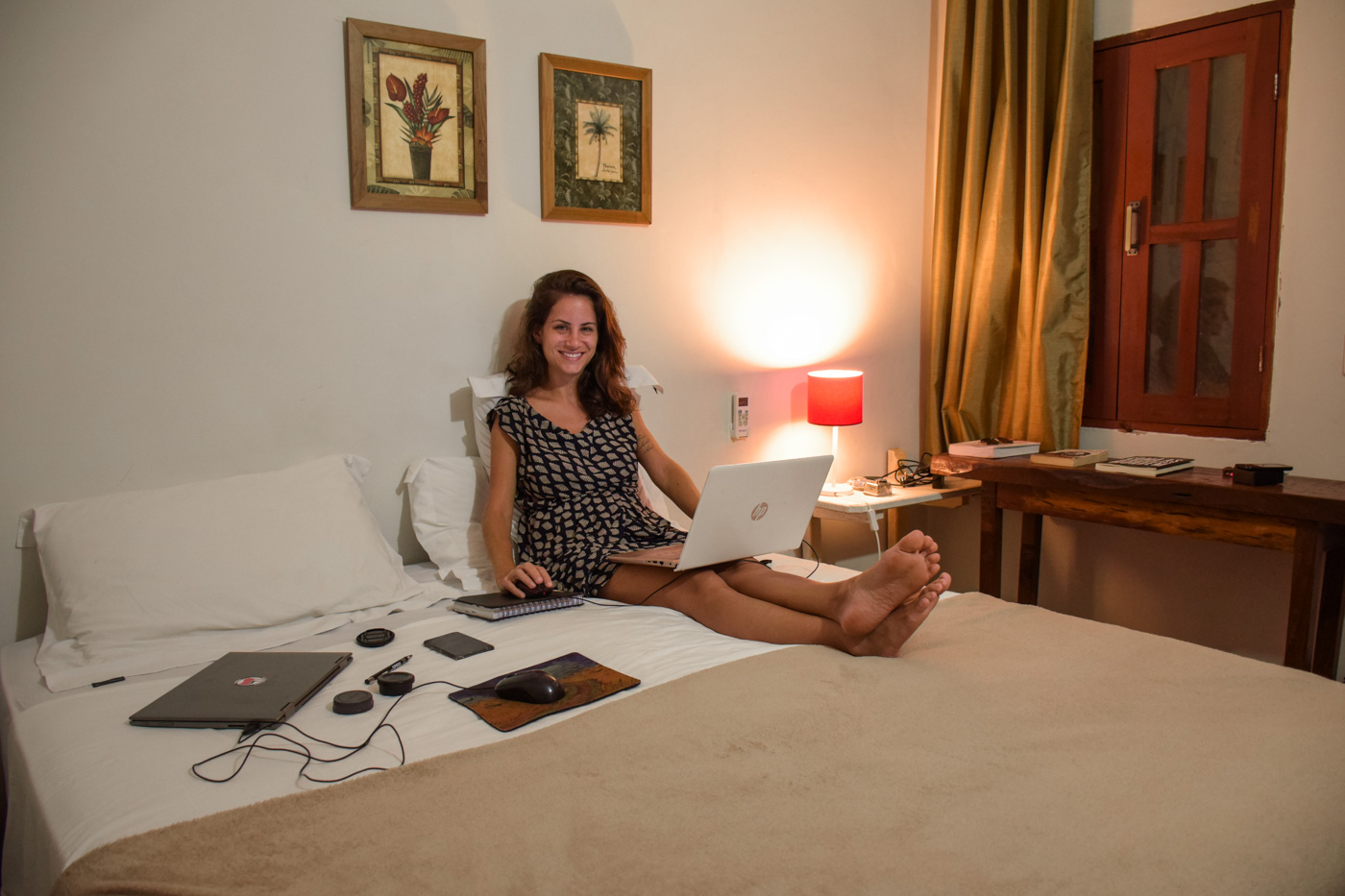 Fe working in the bed of the Flor de Debora Inn
