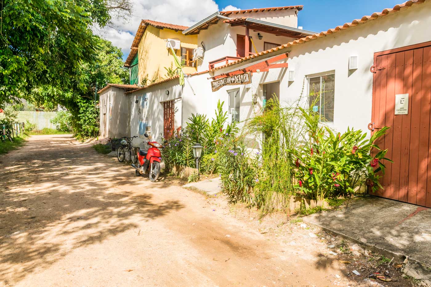 dirty road at the entrance of Flor de Debora Inn in Sao Jorge