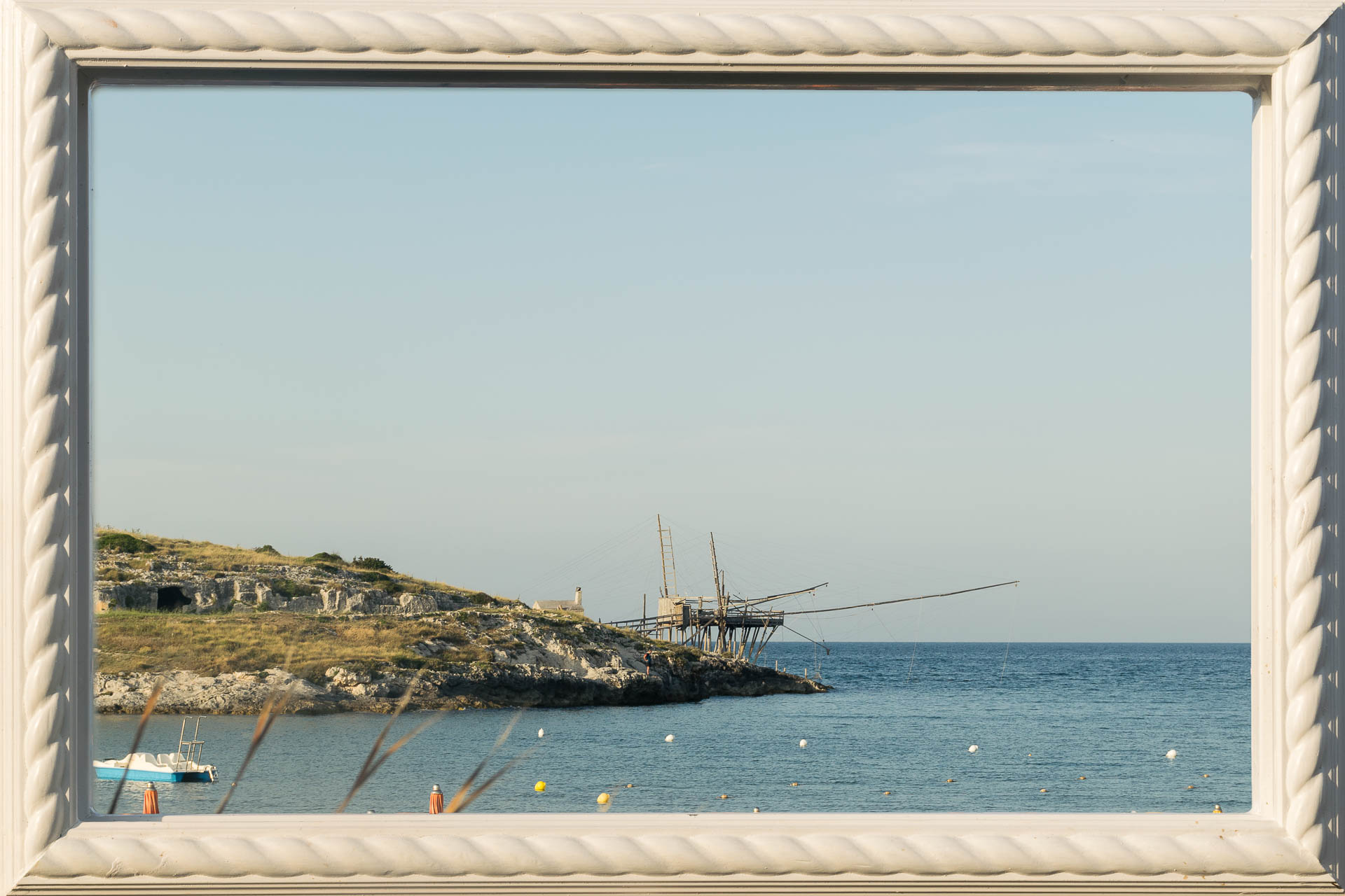 a trabuccho structure, famous in the Gargano region, in the horizon framed