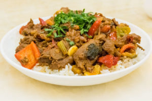 Kyrgyzstan tourist attractions traditional Kyrgyzstan dish of rice, meat and vegetables