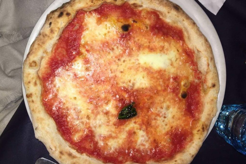 A overhead shot of a margherita pizza