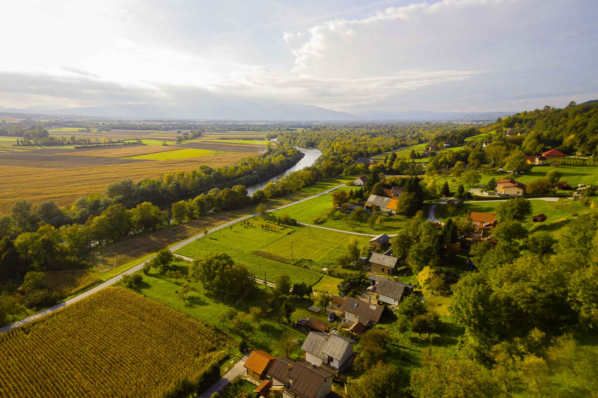 The path from Maribor to Ptuj to cycle in Slovenia from above going by the river with a few villages around