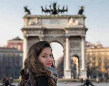 Fe looking back in front of the main arch in Milan Italy