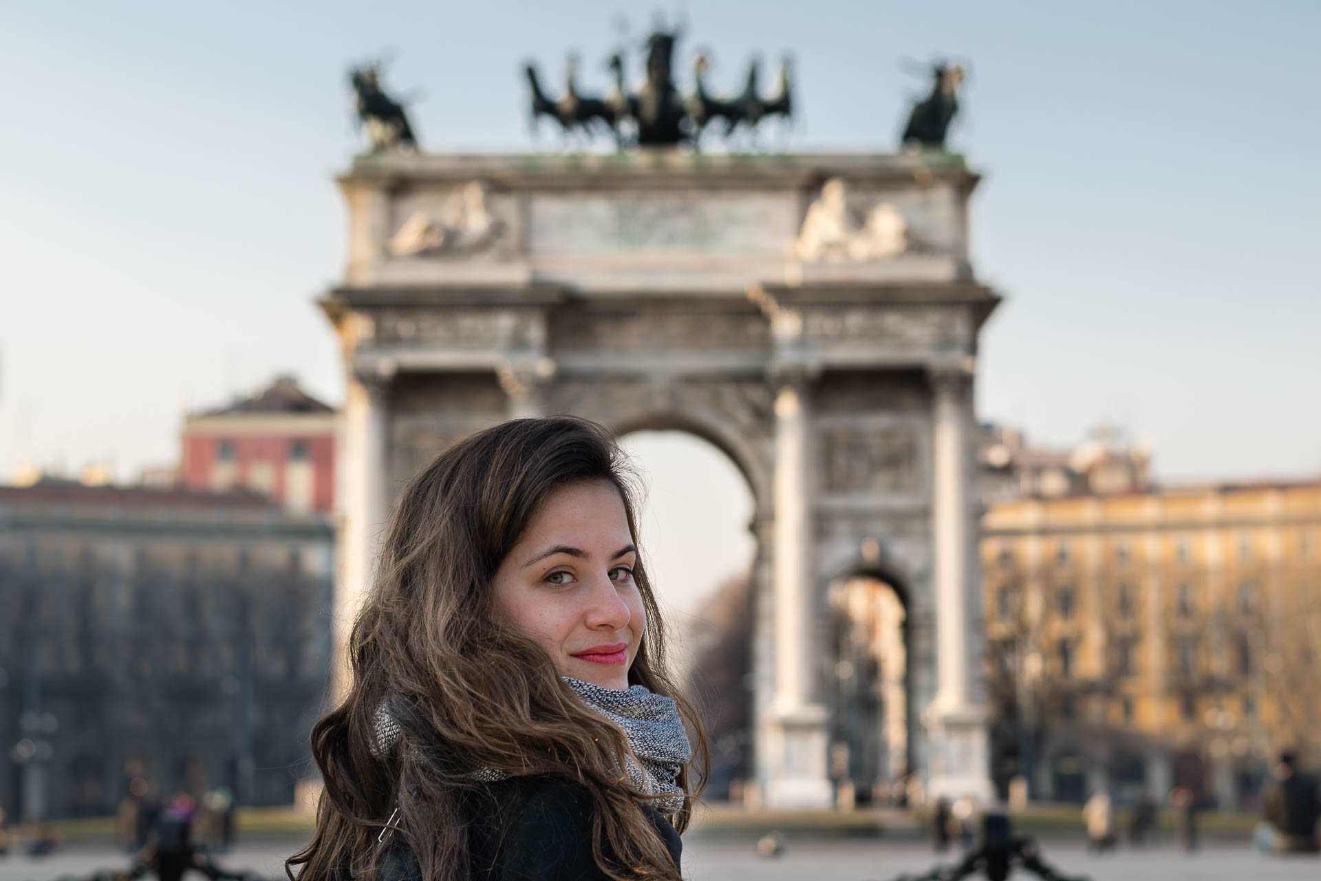 Fe looking back in front of the main arch in Milan Italy