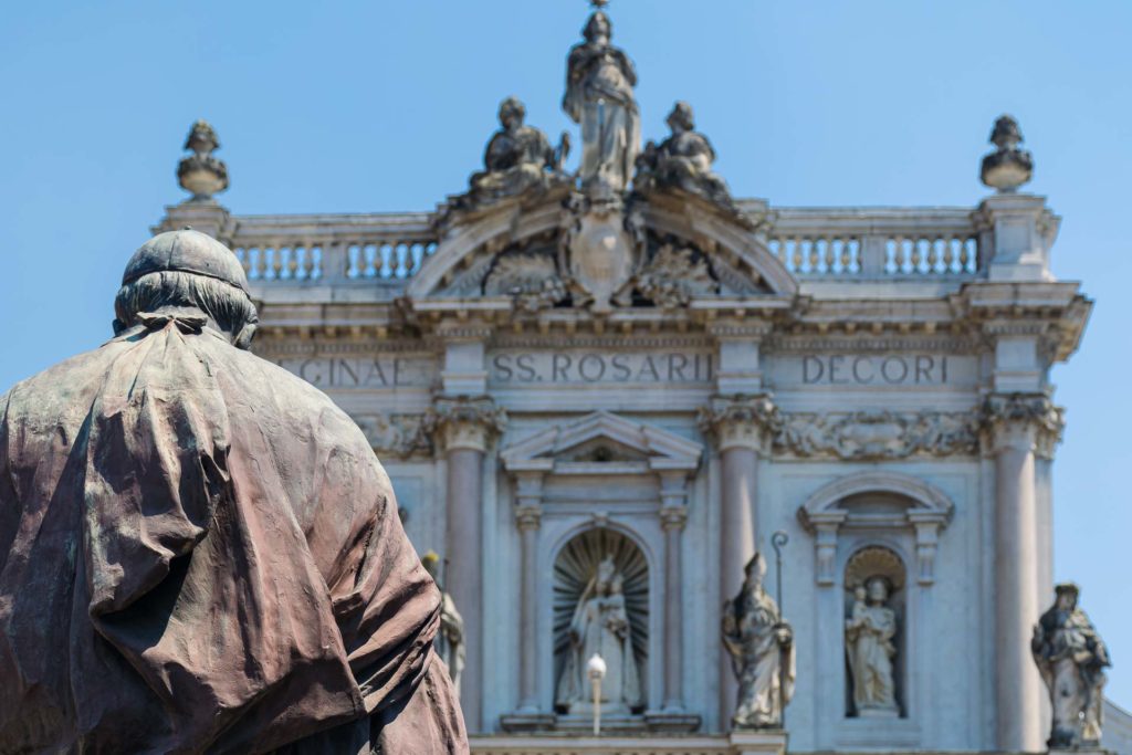 A statue of a pope in front of the church in Fontanellato in Italy