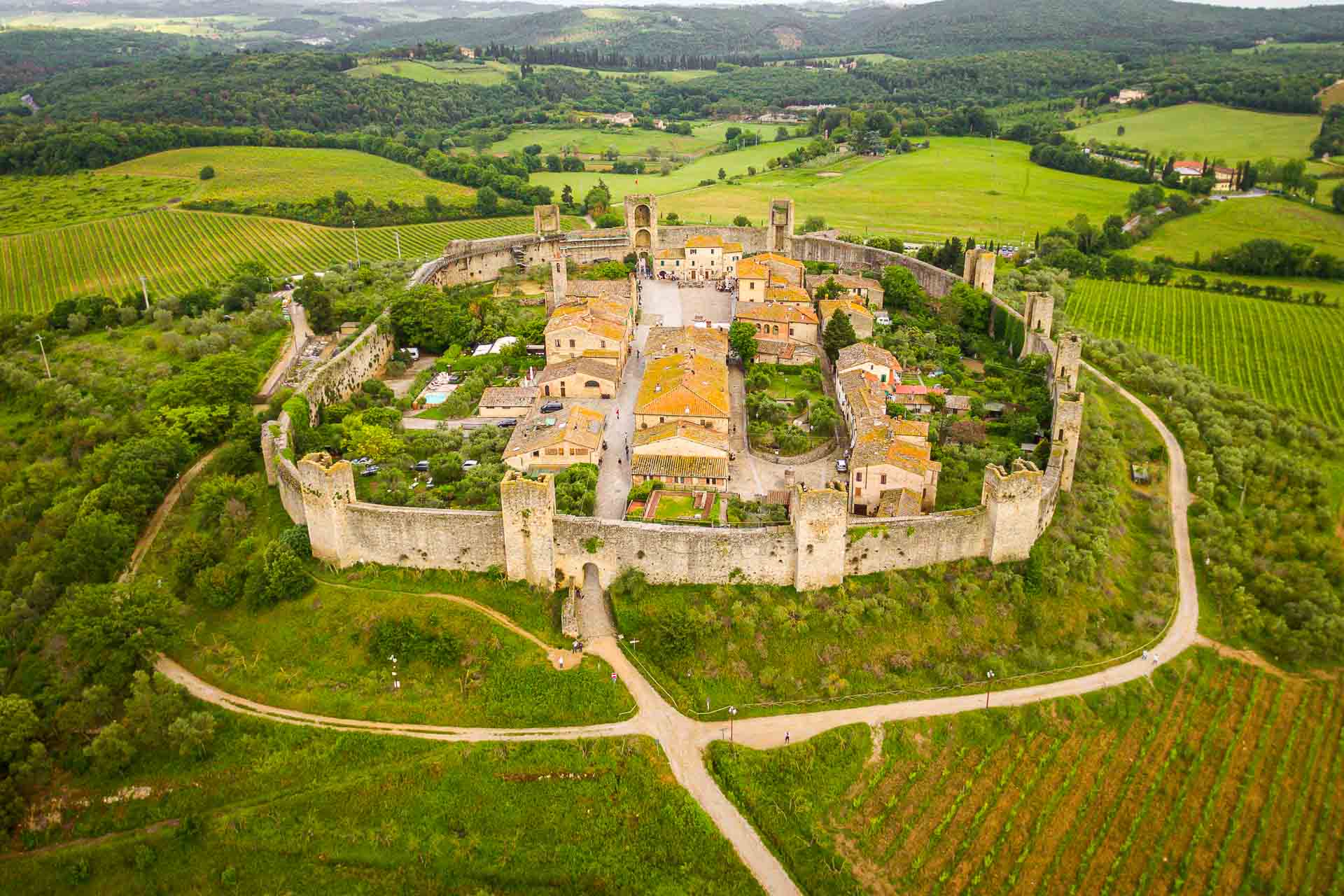 Aerial shot of Monteriggione, a walled and small town in Tuscany Italy