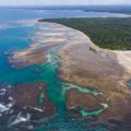 Aerial view of Boipeba Island with a large coral reef by the coast