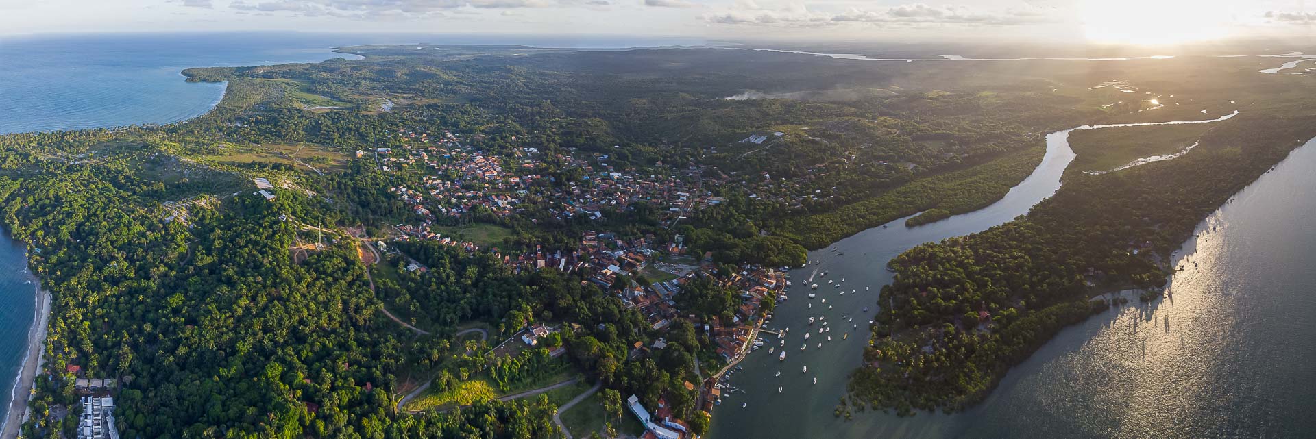 Aerial view of Boipeba Island Brazil in a panorama from the sea to the island and the river that divides the island