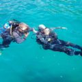 Tiago and the diving instructor in the water