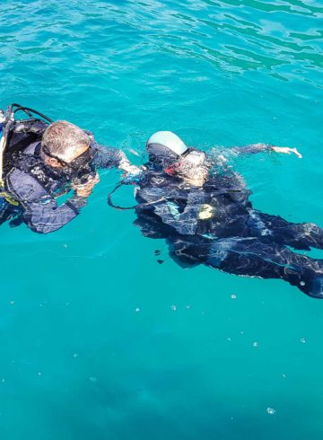 Tiago and the diving instructor in the water