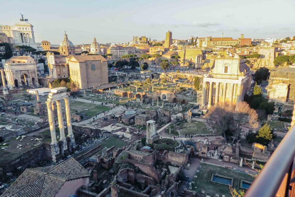 The Roman Forum - Forum Romano - in Rome with the sun on half of the place only