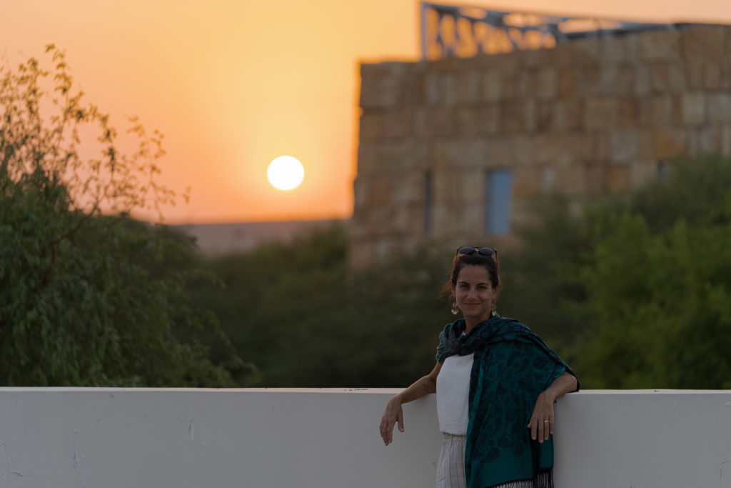 Fernanda and the sun setting in Doha Qatar