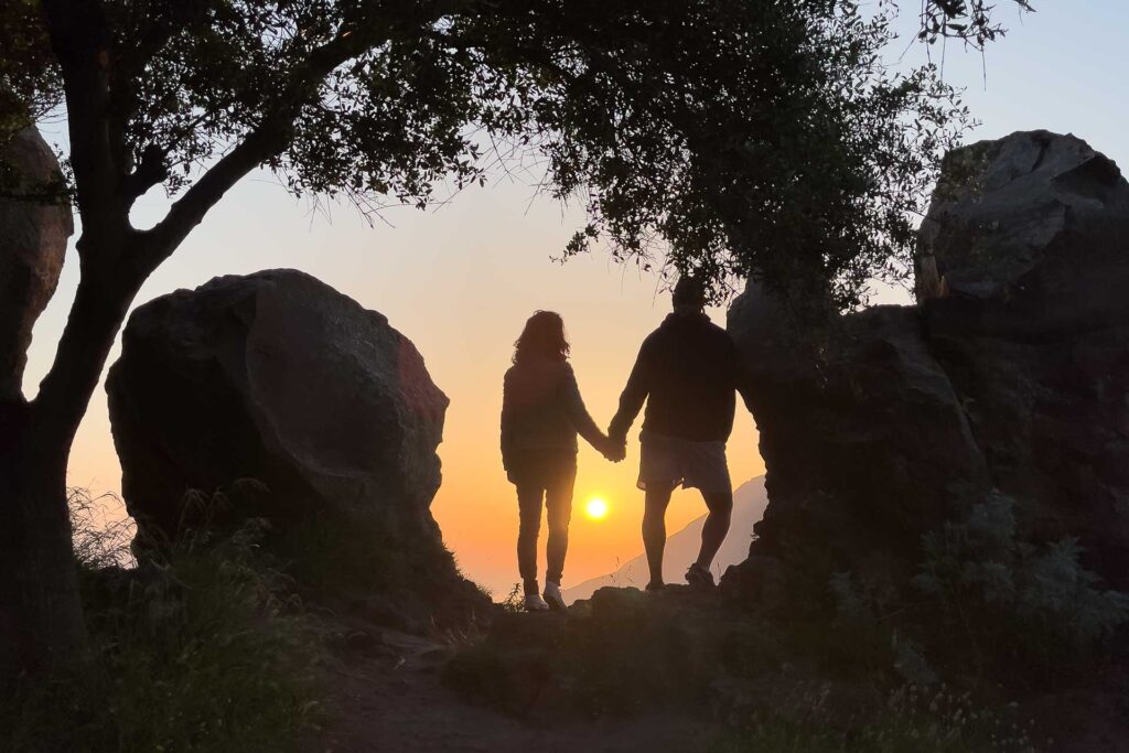 Tiago and Fernanda watching the sunset in Lipari Islands
