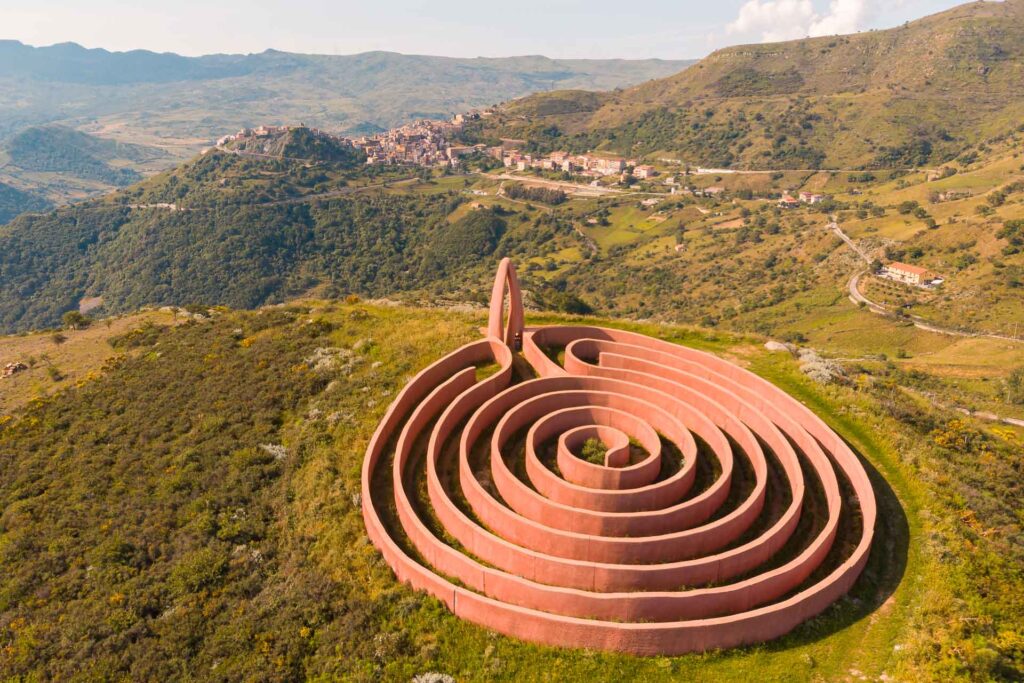 A large labyrinth on top of a mountain overlooking the city in Sicily